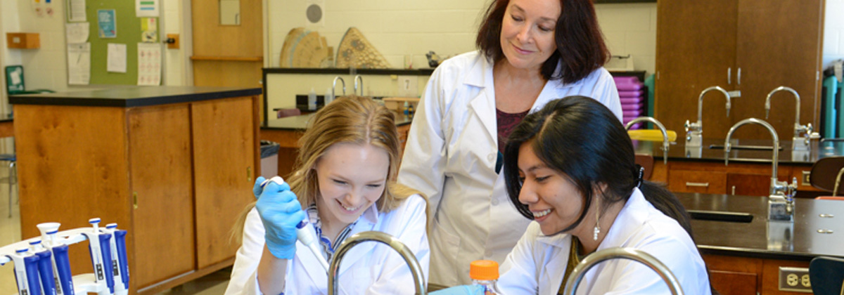 biology students with professor