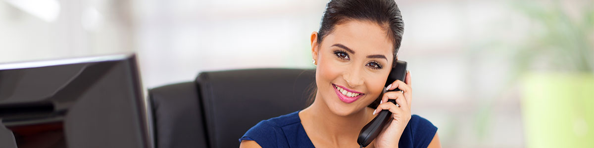 smiling woman on the phone