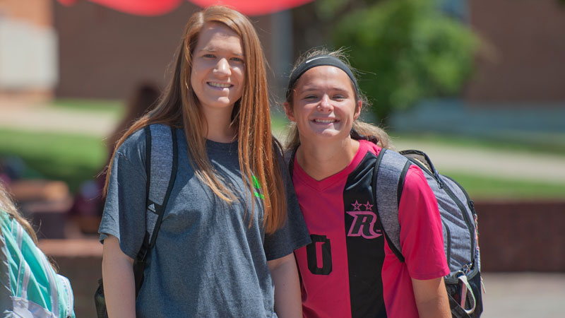 two smiling students