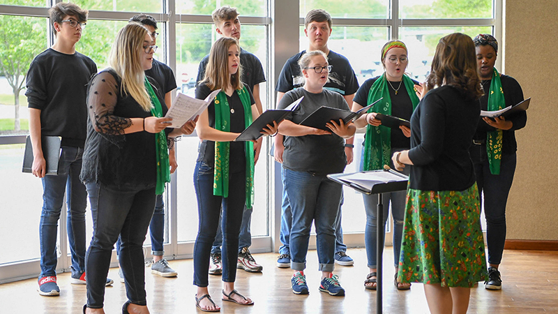 choir singing in Pryor Art Gallery