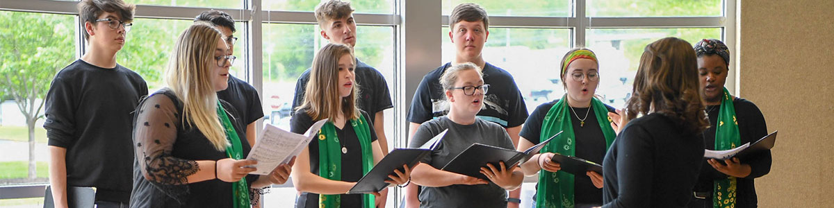 choir singing in Pryor Gallery
