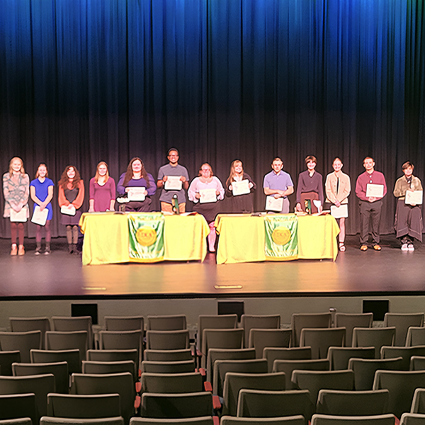 Sigma Kappa Delta students on stage