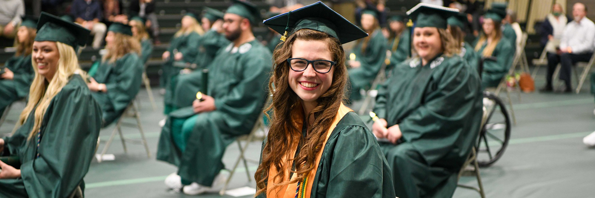 smiling nursing student at graduation