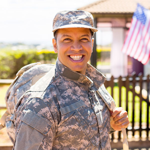 smiling vet in fatigues