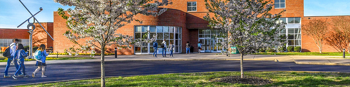 students outside Hickman building