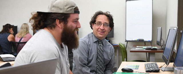 advisor helping student