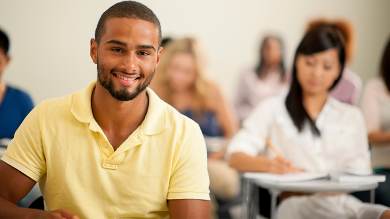 smiling student in classroom