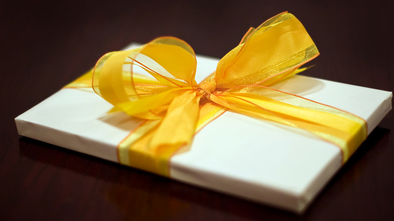gift box with yellow ribbon