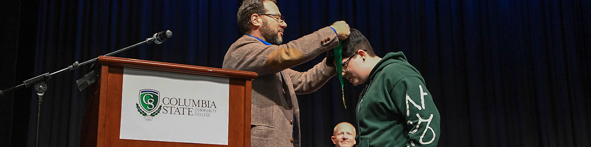 student receiving award