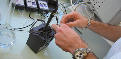 A man testing a battery