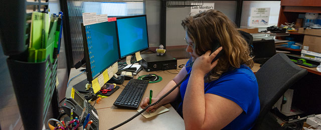 student worker at desk