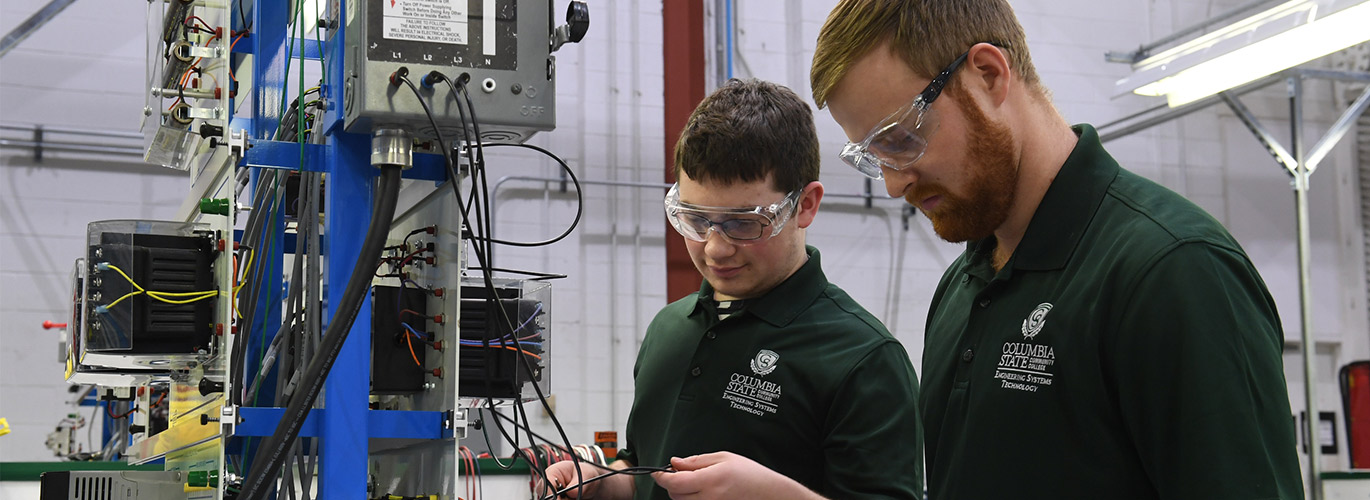 EST students work on equipment 