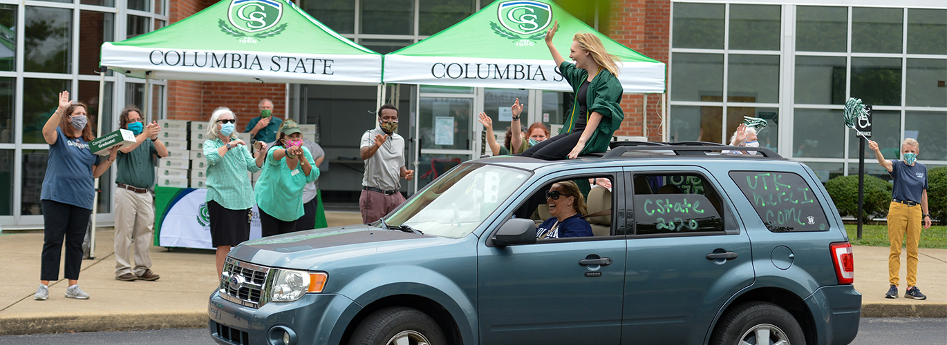 Jenna St. Pierre Waves during ceremony