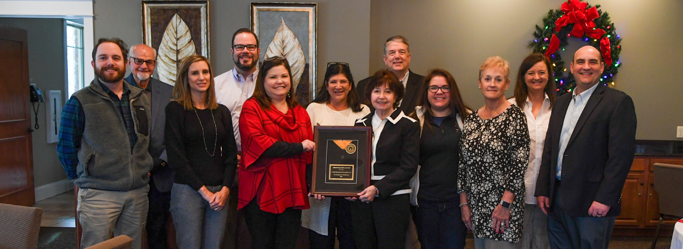 Youth Education Foundation is presented the 2021 Chancellor’s Award of Excellence in Philanthropy. Pictured (left to right): Michael Parks Lawrence, Con Vrailas, Rebecca Melton, Drew Parker, Robyn Graham, Gina Wolfe, Dr. Janet F. Smith, Cris Perkin, Lauren Blevins, Paulette Scoggins, Dawn Moore and Travis Groth.