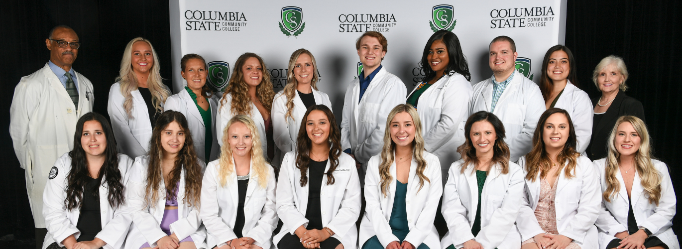Pictured: Columbia State Spring 2022 Respiratory Care graduates (standing, left to right): Roger Major, Columbia State clinical director and associate professor of respiratory care, Alexis F. Edwards, Rachel M. Garrett, Leanna A. Brown, Kayla E. Jernigan, Seth M. Waters, Lainya D. Thomas, Daniel B. Howell, Alexandra G. Rose and Cindy Smith, Columbia State program director and assistant professor of respiratory care. (Sitting, left to right): Morgan E. Rodenhizer, Yubisdreysis Cuellar Perez, Rebecca L. Lundgren, Adriana I. Castillo, Dallas McDonald, Erika P. Thigpen, Chelsey A. Hughes and Alexis L. Hayes.