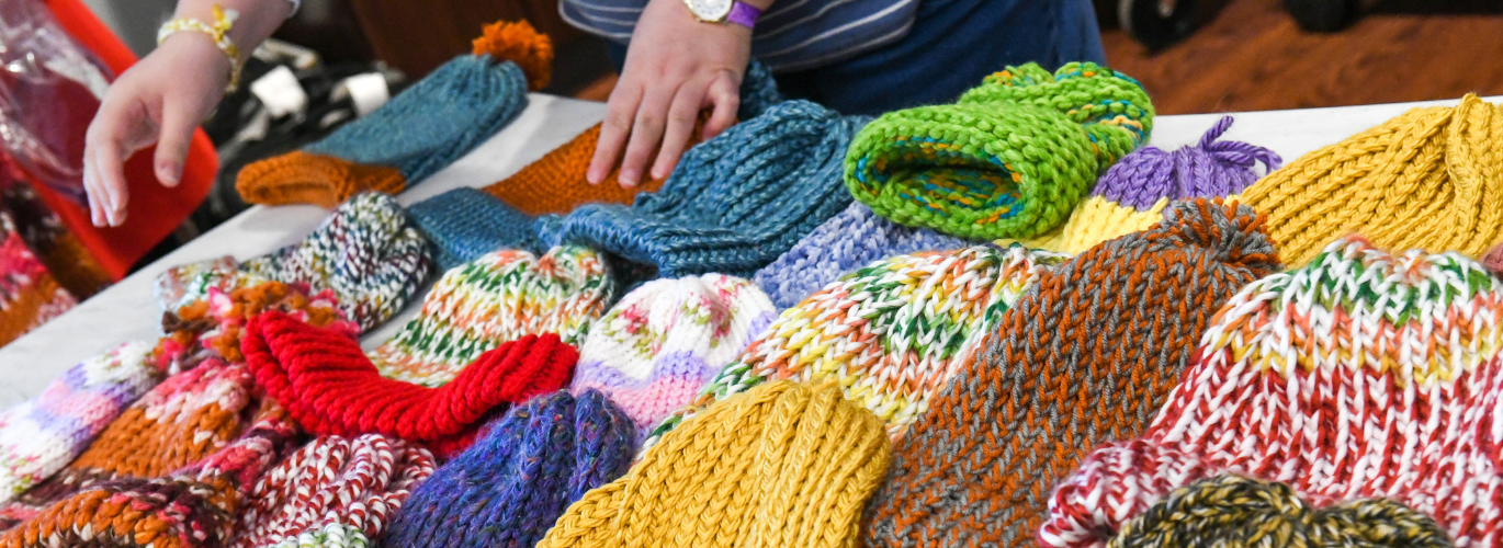 Student-made hats to be donated to Westminster Presbyterian Church’s Room in the Inn.