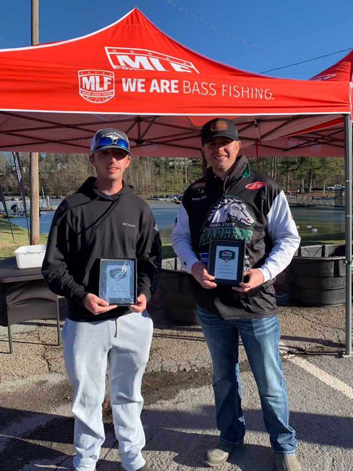 Ryan Prince and Hunter Jones with their plaques.