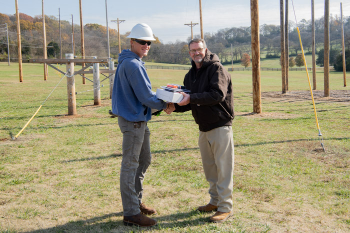 Pre-Apprentice Lineworker Academy Outstanding Student Award winner Jaden Coffin and Dr. Dearl Lampley, Columbia State vice president of the Williamson Campus and external services.