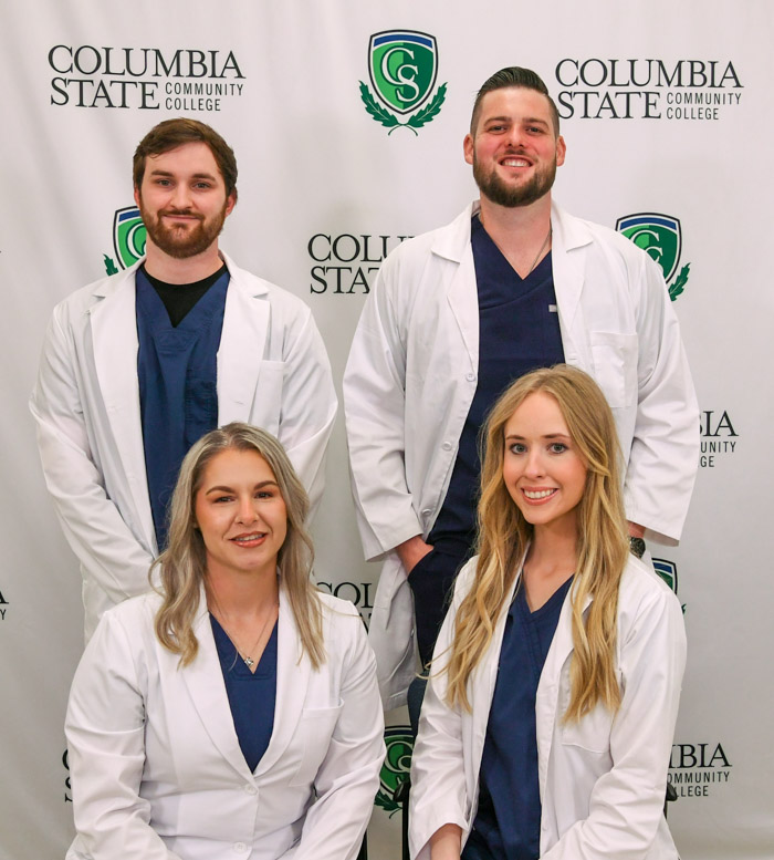 Pictured (standing, left to right): Rutherford County nursing graduates Cody Lane and Brandon Gosik. (Sitting, left to right): Ashley A. Tabor and Rachel A. Dobbs.