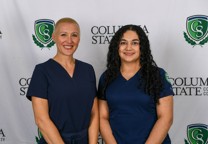 Pictured (left to right): Davidson County graduates Amber Sutphen and Karla Ayala-Alvarenga.