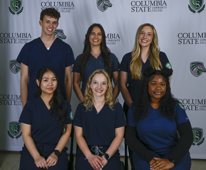 Pictured (standing, left to right): Davidson County graduates Chase Moulton, Graysan Burnette and Carson Rogers. Pictured (sitting, left to right): Angelar Mo, Brittany Steighner and Corena Adams.