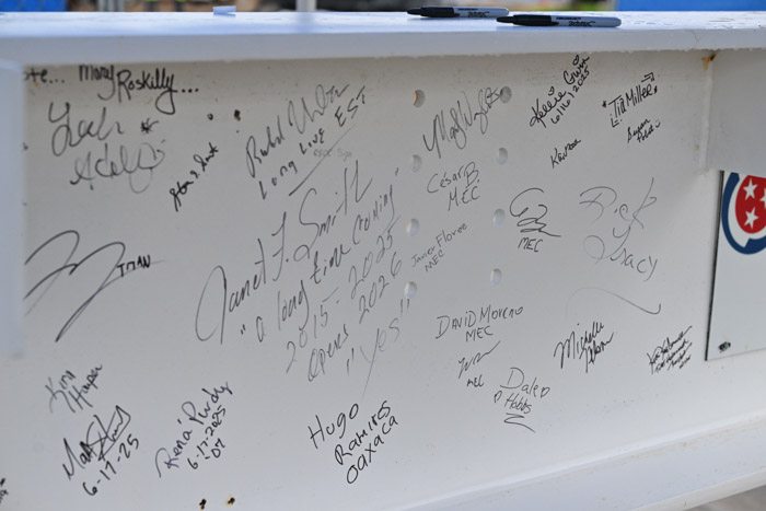 Community members and Columbia State faculty and staff signatures are seen on the “Topping Out” beam.