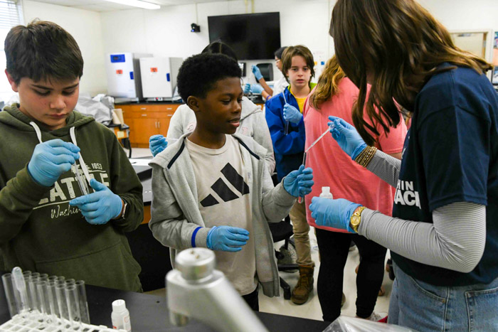 STEM Within Reach students collect samples during the “Infectious Diseases” activity. 
