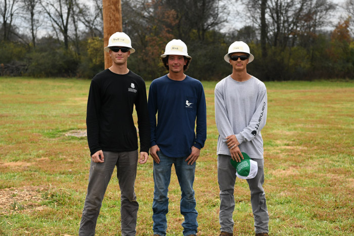 80-foot pole climb winners Gabriel Trujillo from Thompson’s Station in third place, Jeremiah Ragsdale from Culleoka in second place and Travis Garza from Columbia in first place.
