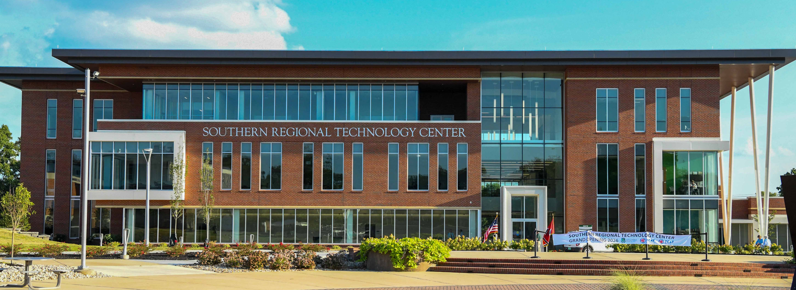 A photo shows the front of the Southern Regional Technology Center during the daytime.