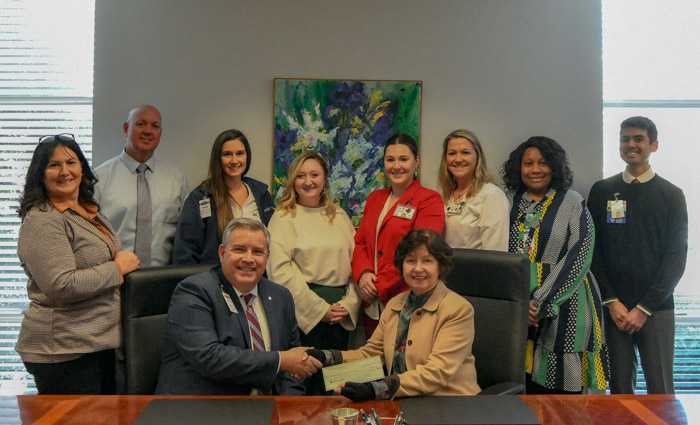 Pictured (standing left to right): Bethany Lay, Columbia State vice president for advancement and executive director of the Columbia State Foundation; Craig Jones, administrator at NHC Maury Transitional Care Center; Katie Bostelman, director of nursing at NHC Maury TCC; Anna Clare Sheeter, director of nursing at NHC Columbia and Columbia State alum; Whitney Rumsey, administrator at NHC Columbia; Spenser Cheatham, director of nursing at NHC Lewisburg and Columbia State alum; Lacorya Donley, director of nursing at NHC Pulaski; and Douglas Wong, administrator at NHC Pulaski. (Sitting, left to right): Scott Bidwell, Vice President of NHC’s South Central Region, and Dr. Janet F. Smith, Columbia State president.