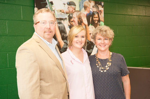 Dr. William B. Sutter Scholarship Man and two women in Pryor lobby