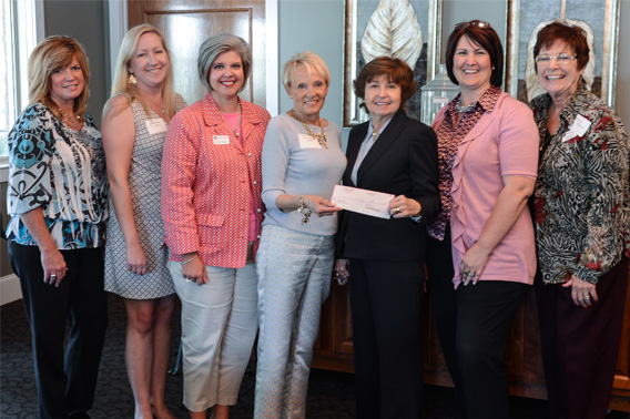 The scholarship check was presented at the September WOW luncheon.