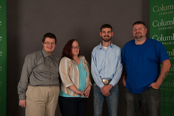 Four students smile for picture