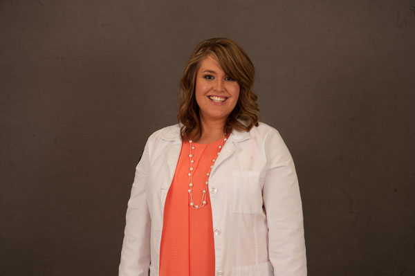 Brown haired woman smiling