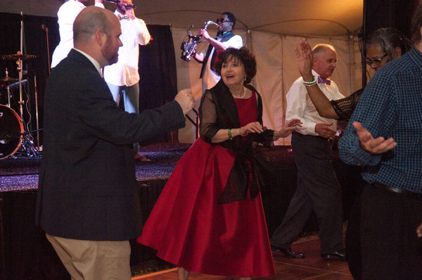 Woman in red dress dancing