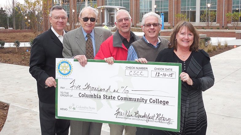 Rotary Club and CSCC staff with donation check