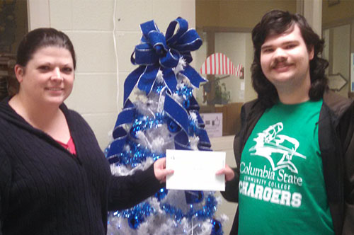 Matthew-scholarship Matthew receiving scholarship