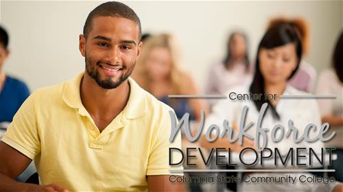 Workforce Development Student at desk in classroom