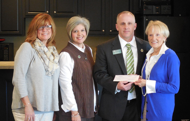 WOW Maury County Henson receives scholarship check from members of WOW