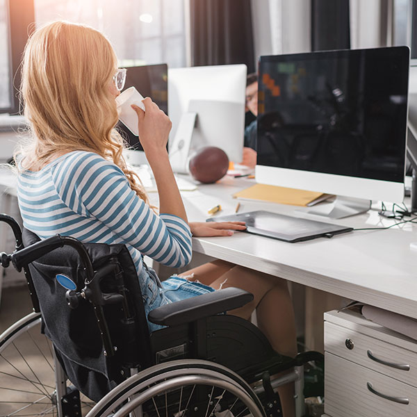 student in wheelchair at computer