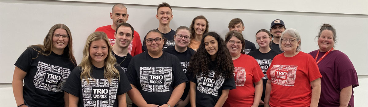 group of students and staff wearing TRIO shirts